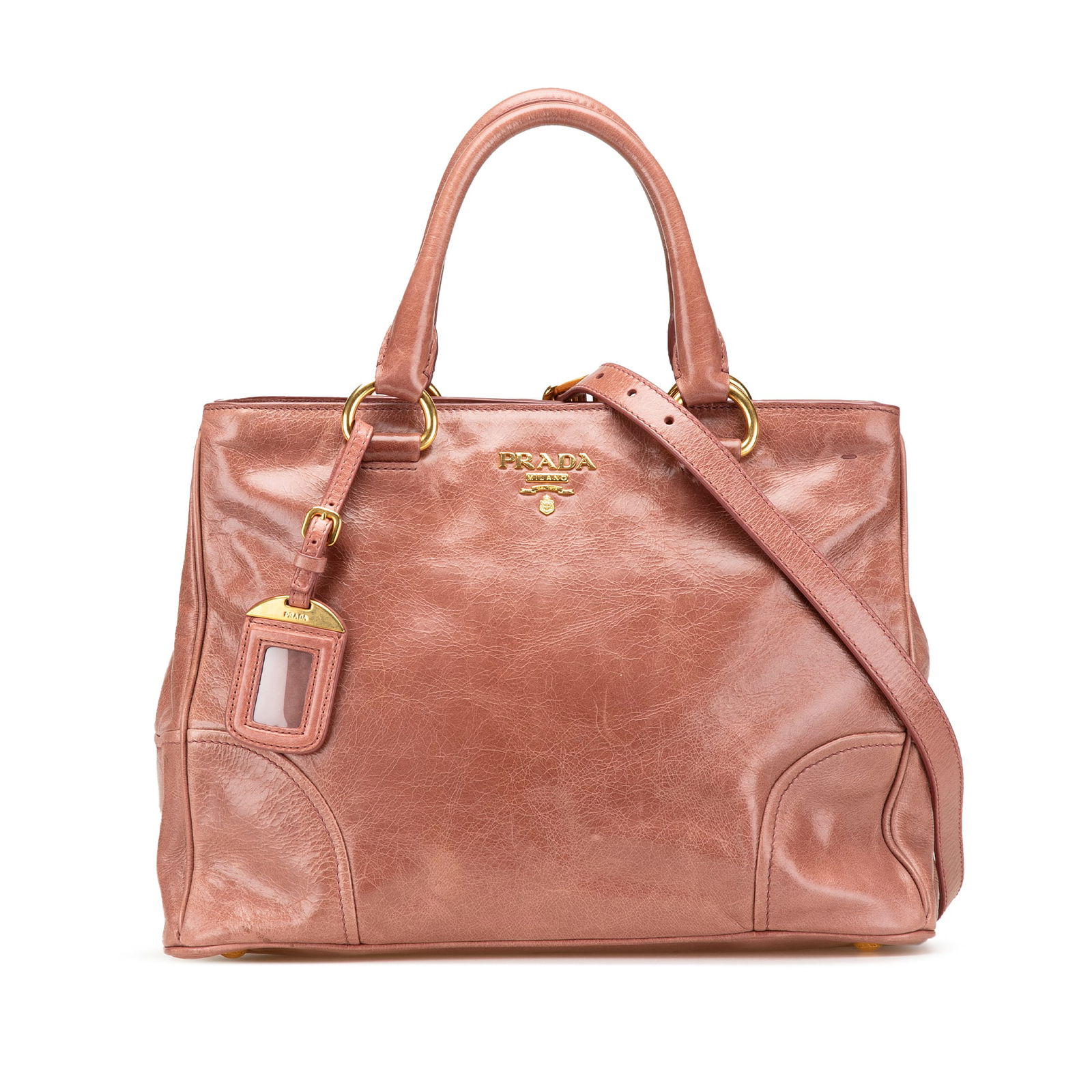 Prada Vitello Shine Leather Satchel in Pink with Detachable Strap: Prada Vitello Shine Leather Satchel in Pink with Detachable Strap Introducing the Prada Vitello Shine Satchel, a luxurious and stylish accessory crafted from high-quality leather. This satchel feature