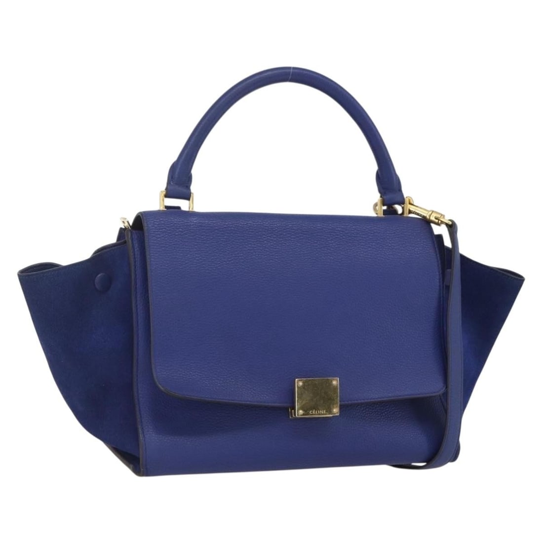 Celine Trapeze Blue Leather Handbag with Shoulder Strap Italy: Celine Trapeze Blue Leather Handbag with Shoulder Strap Italy This CELINE Trapeze handbag features a blue and gold leather exterior. Designed for versatile use, it can be carried by hand or worn over