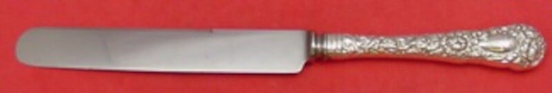 Durgin Chrysanthemum Sterling Silver Dinner Knife Blunt 9 3/4": Durgin Chrysanthemum Sterling Silver Dinner Knife Blunt 9 3/4" This exquisite dinner knife features the elegant Chrysanthemum pattern by Durgin, crafted from high-quality sterling silver. The knife ha