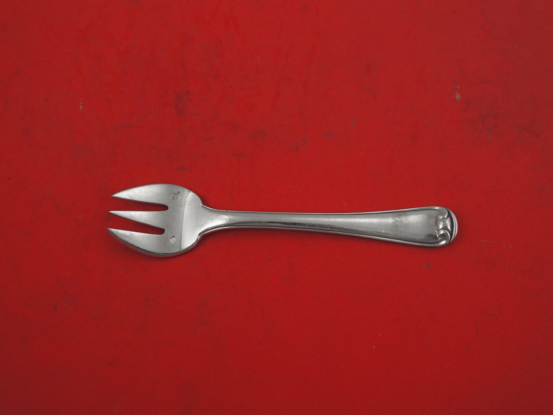 Puiforcat Mazarin Sterling Silver Cocktail Oyster Fork 4 7/8": Puiforcat Mazarin Sterling Silver Cocktail Oyster Fork 4 7/8" This Mazarin cocktail fork, crafted by Puiforcat, combines elegance and functionality in a stunning piece of sterling silver. With a lengt