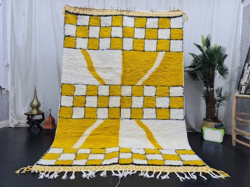 Authentic Handwoven Moroccan 8 x 5 Feet Yellow White Wool Rug: Authentic Handwoven Moroccan 8 x 5 Feet Yellow White Wool Rug This stunning soft yellow and white rug is an elegant addition to any space. Handwoven by local Berber women in the Atlas Mountains of Mor