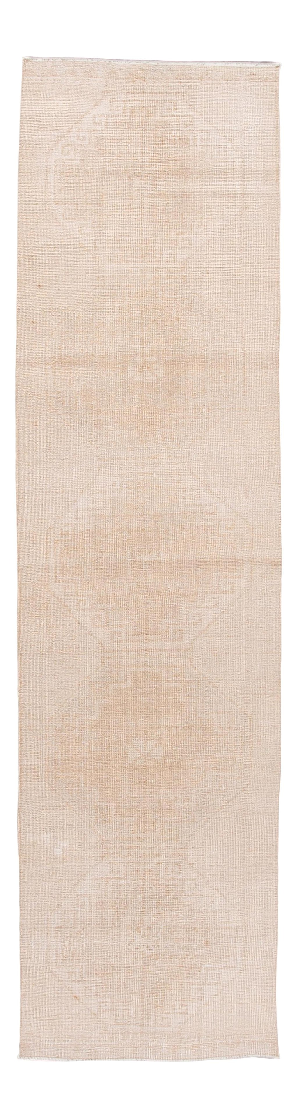 Vintage Turkish Handmade Wool Runner Rug Beige Tribal Design 2'10 x 11'5: Vintage Turkish Handmade Wool Runner Rug Beige Tribal Design 2'10 x 11'5 This exquisite vintage Turkish handmade wool runner features a stunning beige field complemented by tan accents, showcasing a c