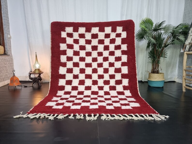 Authentic Handmade White Red Moroccan Wool Rug 8x5: Authentic Handmade White Red Moroccan Wool Rug 8x5 Discover the charm of this Authentic Soft Handmade White & Red Rug, meticulously handwoven by local Berber women weavers in the Atlas Mountains. Craf