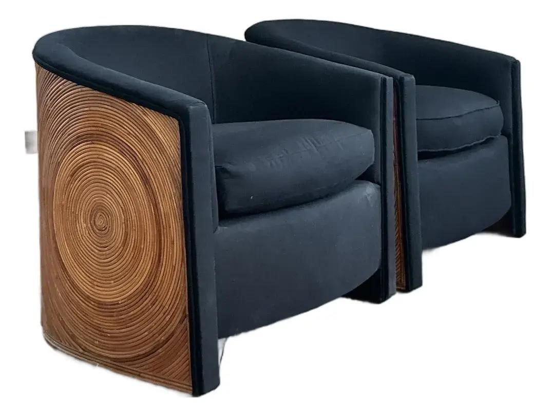 Vintage Boho Swirl Lounge Chairs Pair Black Upholstery: Vintage Boho Swirl Lounge Chairs Pair Black Upholstery This stunning pair of Vintage Boho Swirl Pencil Reed Lounge Chairs encapsulates the bold, sculptural forms of late 20th-century design. Featuring