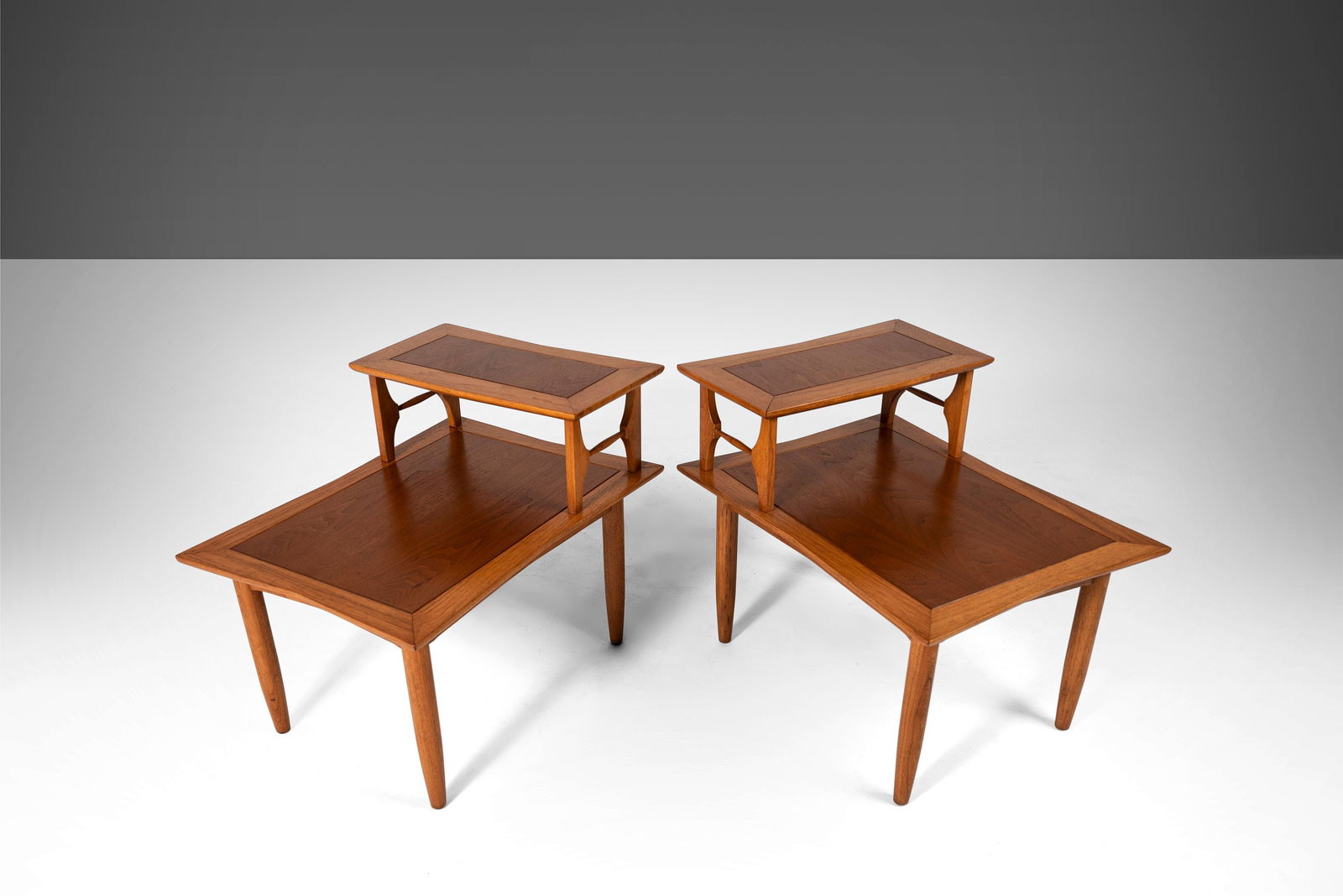 Mid Century Modern 2-Tier End Tables by Lubberts & Mulder for Tomlinson 1960s: Mid Century Modern 2-Tier End Tables by Lubberts & Mulder for Tomlinson 1960s This pair of 2-tier end tables showcases exceptional Mid Century Modern architecture, attributed to Lubberts & Mulder for