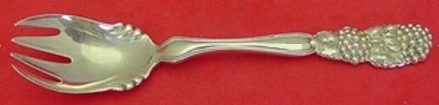 Tiffany & Co Blackberry Sterling Silver Ice Cream Fork 5 1/2": Tiffany & Co Blackberry Sterling Silver Ice Cream Fork 5 1/2" Indulge in elegance with this exquisite ice cream fork from Tiffany & Co., featuring the charming Blackberry pattern. Crafted from high-qu