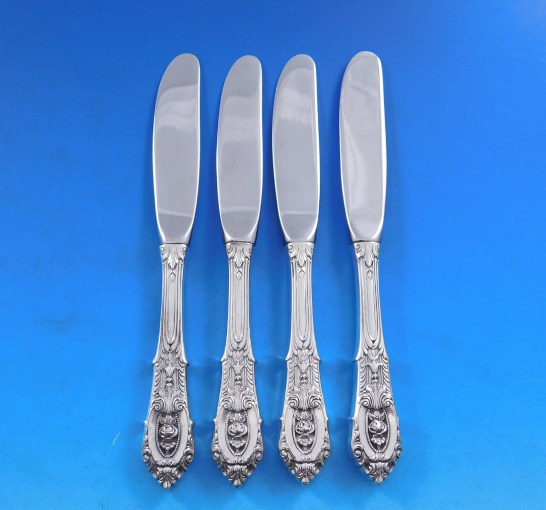 Wallace Rose Point Sterling Silver Butter Spreader Set of 4 Modern Blades 6 1/4": Wallace Rose Point Sterling Silver Butter Spreader Set of 4 Modern Blades 6 1/4" Enhance your dining experience with this elegant set of 4 butter spreaders from the Rose Point pattern by Wallace. Each