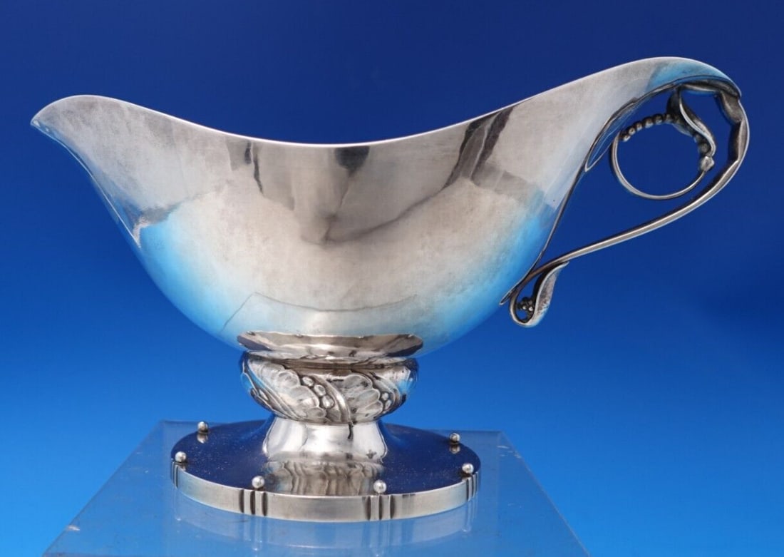 Georg Jensen Sterling Silver Gravy Boat #177A GJ Mark 4.75 x 8 Inch: Georg Jensen Sterling Silver Gravy Boat #177A GJ Mark 4.75 x 8 Inch This exquisite Georg Jensen Sterling Silver Gravy Boat, model #177A, is a stunning example of the renowned craftsmanship of one of t
