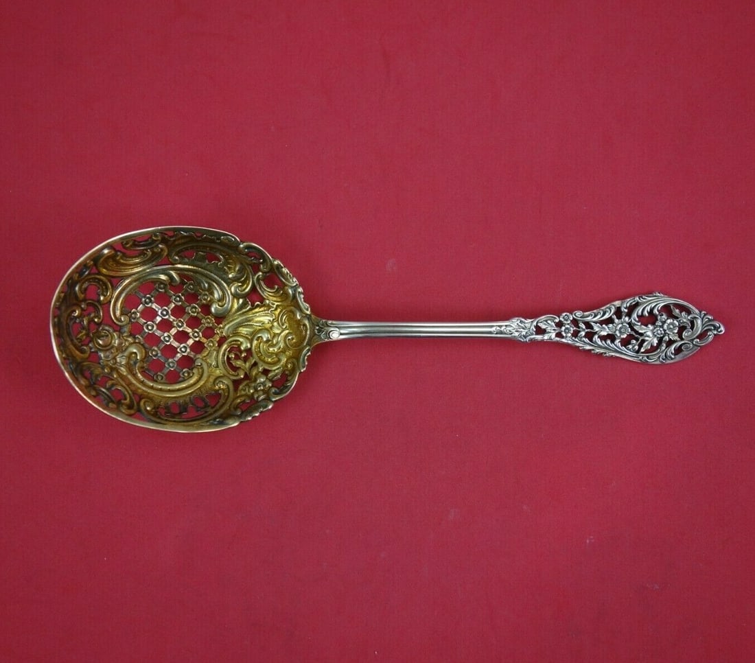 Dominick & Haff Trianon Pierced Sterling Silver Pea Spoon 8 3/4" Serving: Dominick & Haff Trianon Pierced Sterling Silver Pea Spoon 8 3/4" Serving This exquisite Trianon Pierced Serving Spoon, crafted by Dominick & Haff, showcases a stunning design that dates back to 1850-1