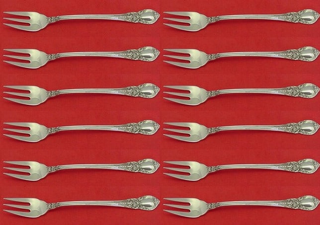 Lunt American Victorian Sterling Silver Cocktail Fork Set 12 Pieces 5 3/4": Lunt American Victorian Sterling Silver Cocktail Fork Set 12 Pieces 5 3/4" Enhance your dining experience with this exquisite 12-piece set of cocktail forks, featuring the elegant American Victorian p