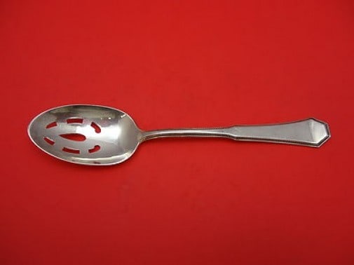 Reed and Barton American Federal Sterling Silver Slotted Spoon 8.5": Reed and Barton American Federal Sterling Silver Slotted Spoon 8.5" This exquisite slotted serving spoon from Reed & Barton features the classic American Federal pattern. Crafted from high-quality ste