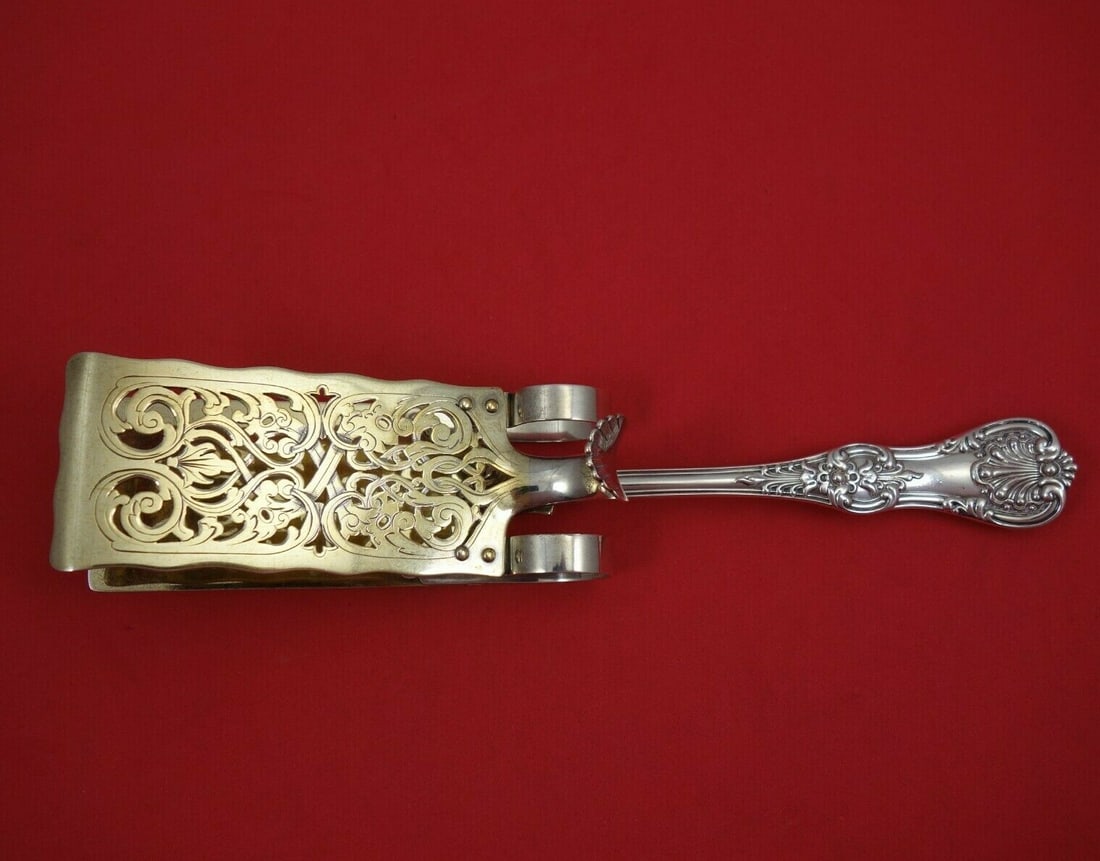 Tiffany & Co English King Sterling Silver Sandwich Tong 9 1/8 Mechanical Gold Wash: Tiffany & Co English King Sterling Silver Sandwich Tong 9 1/8 Mechanical Gold Wash This exquisite sandwich tong, designed in the elegant English King pattern by Tiffany & Co., is a stunning example of