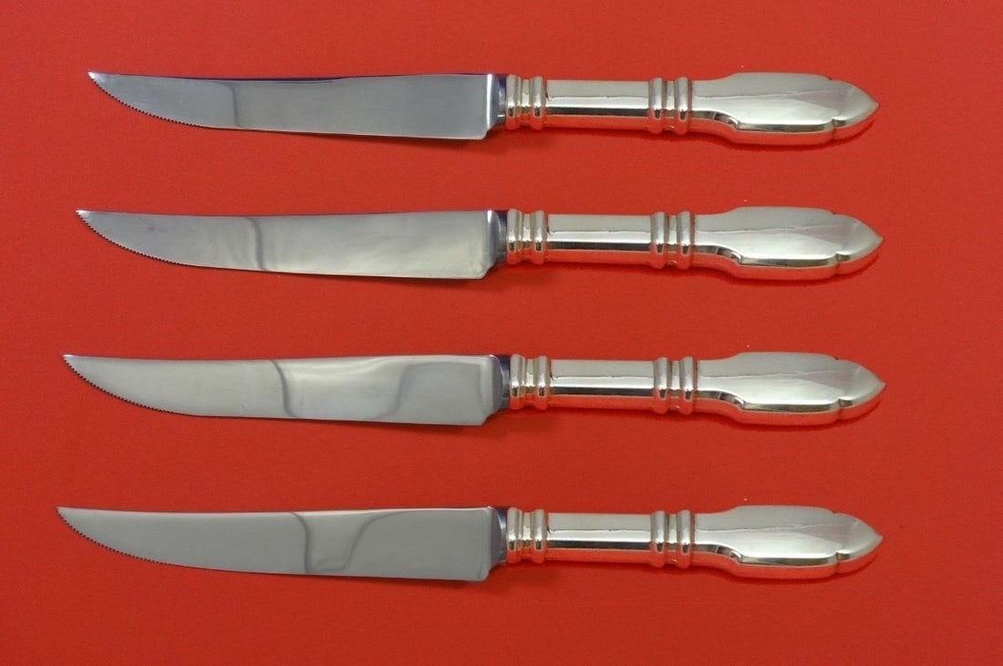 Graff W & D Robert Bruce Sterling Silver Steak Knife Set 4pc Custom: Graff W & D Robert Bruce Sterling Silver Steak Knife Set 4pc Custom Enhance your dining experience with this exquisite 4-piece steak knife set from the Robert Bruce pattern by Graff W & D. Each knife