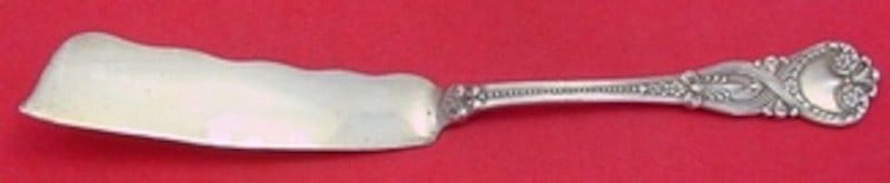Sterling Silver Master Butter Knife Saint James Pattern Flat Handle Wavy Blade 7 1/8": Sterling Silver Master Butter Knife Saint James Pattern Flat Handle Wavy Blade 7 1/8" This is a Tiffany & Co. Saint James pattern sterling silver master butter knife, featuring a flat handle and a wav