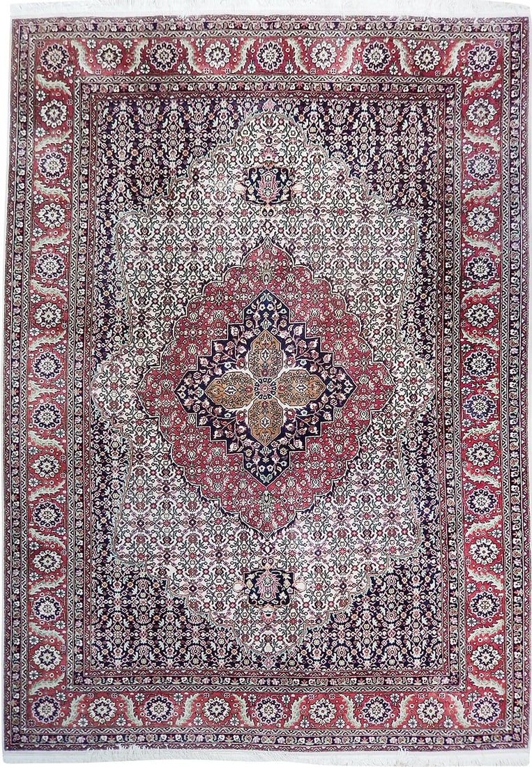 Handcrafted Ivory Semi Antique Persian Tabriz Rug 6'6 x 10': Handcrafted Ivory Semi Antique Persian Tabriz Rug 6'6 x 10' Free continental US Shipping Discover the elegance of this handcrafted 6' 6" x 10' Ivory Semi Antique Persian Tabriz Rug, made by skilled Pe