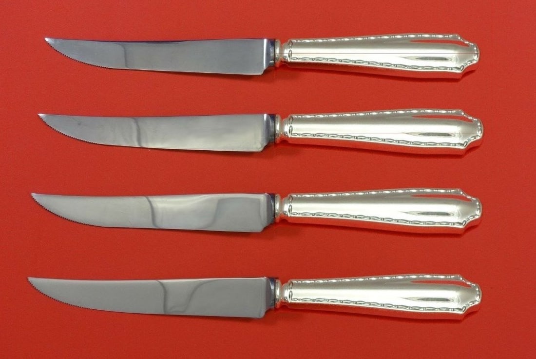 Tiffany & Co. Marquise Sterling Silver Steak Knife Set 4pc Custom Made: Tiffany & Co. Marquise Sterling Silver Steak Knife Set 4pc Custom Made This exquisite 4-piece steak knife set by Tiffany & Co. features the elegant Marquise pattern. Crafted from sterling silver with