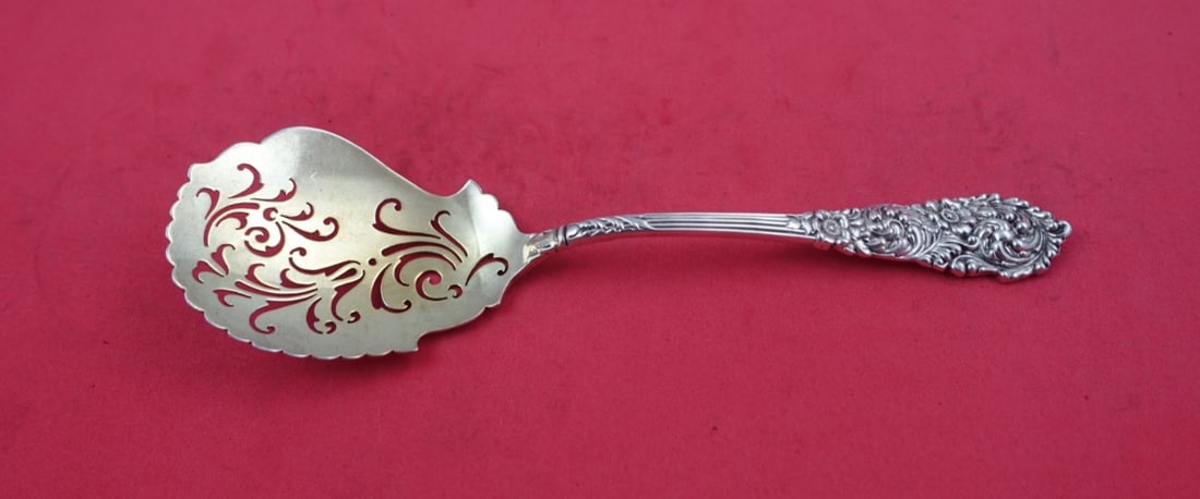 Reed and Barton Trajan Sterling Silver Pierced Confection Spoon 7.25 inch: Reed and Barton Trajan Sterling Silver Pierced Confection Spoon 7.25 inch This exquisite Trajan confection spoon by Reed and Barton is crafted from sterling silver, showcasing a beautiful gold wash an