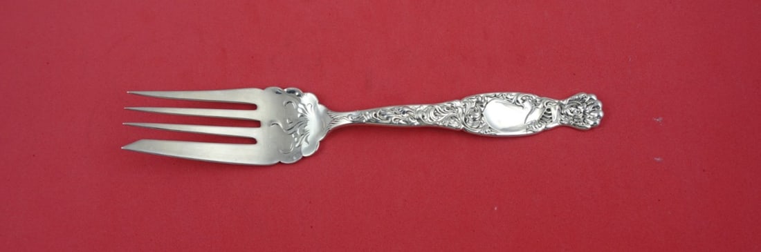Whiting Heraldic Sterling Silver Cold Meat Fork 7.75": Whiting Heraldic Sterling Silver Cold Meat Fork 7.75" This exquisite cold meat fork from the Heraldic pattern by Whiting is crafted from high-quality sterling silver. Measuring 7 3/4 inches, it featur