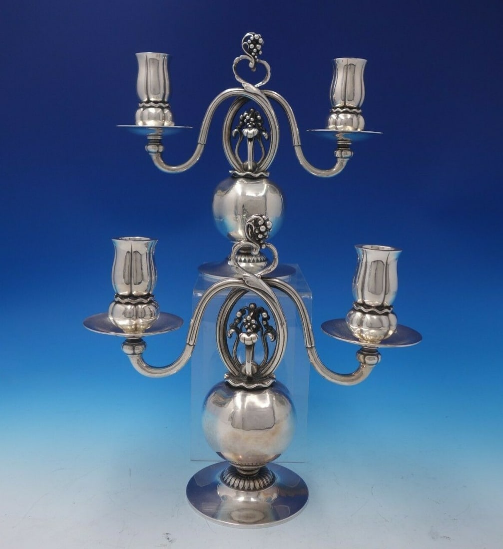 Georg Jensen Pomegranate Sterling Silver Candelabra Pair 2-Light Mid-Century Modern: Georg Jensen Pomegranate Sterling Silver Candelabra Pair 2-Light Mid-Century Modern This exquisite pair of Mid-Century Modern candelabras from the renowned Georg Jensen features the elegant Pomegranat