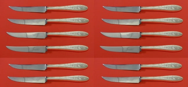 Wedgwood by International Sterling Silver Steak Knife Set 12 pcs 8.5 inches: Wedgwood by International Sterling Silver Steak Knife Set 12 pcs 8.5 inches Elevate your dining experience with this exquisite set of 12 steak knives from the Wedgwood pattern by International Sterlin