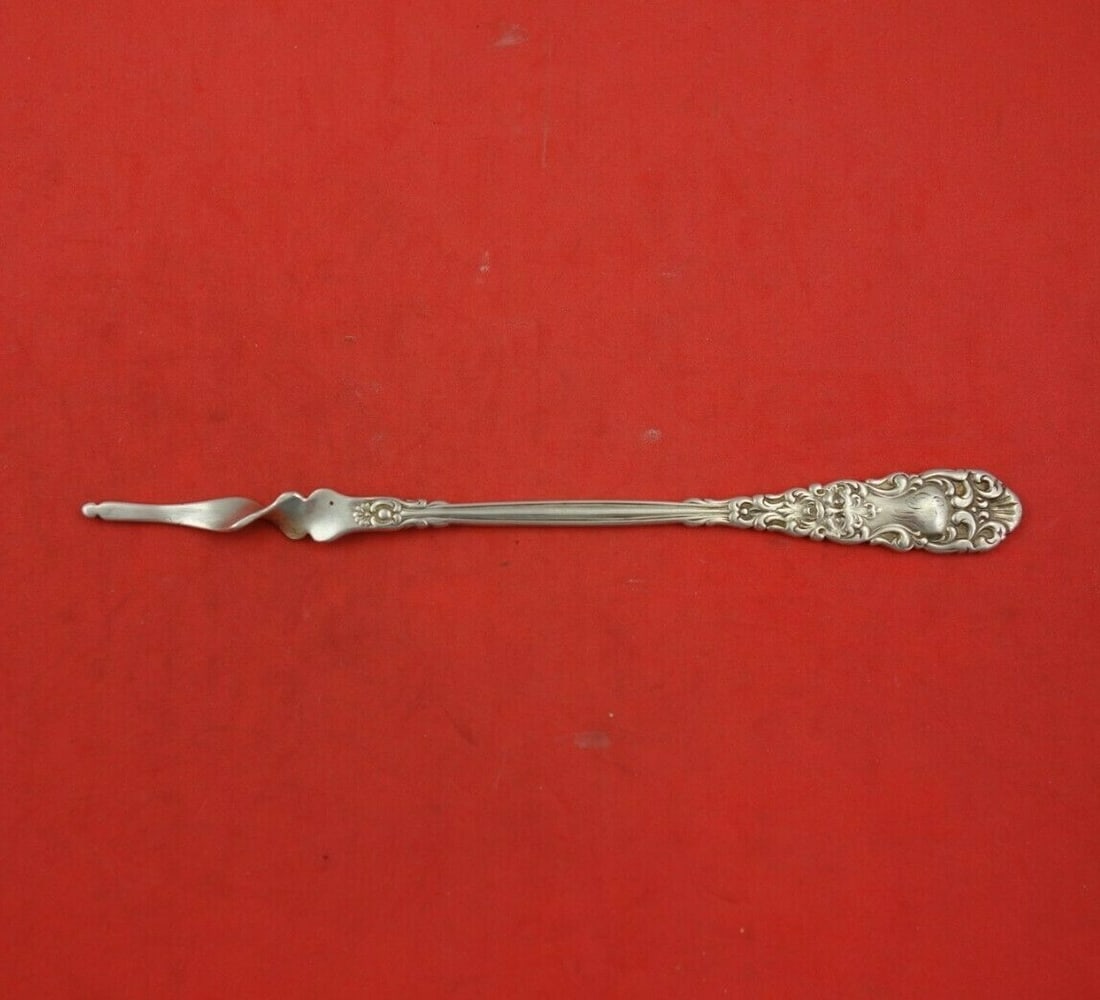 Dominick & Haff Renaissance Sterling Silver Twisted Butter Pick 6": Dominick & Haff Renaissance Sterling Silver Twisted Butter Pick 6" This exquisite butter pick, crafted by Dominick & Haff, showcases the elegant Renaissance pattern. Made from high-quality sterling si