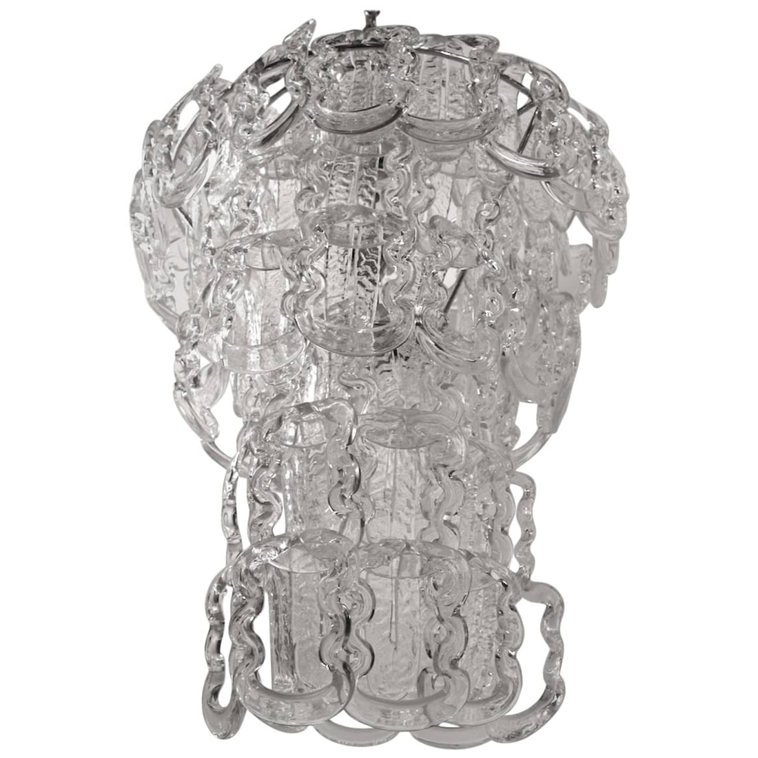 Vistosi Murano Glass Chandelier by Angelo Mangiarotti: Vistosi Murano Glass Chandelier by Angelo Mangiarotti This stunning Murano chandelier, attributed to renowned designer Angelo Mangiarotti, showcases a unique tiered or 'Wedding Cake' form. The fixture