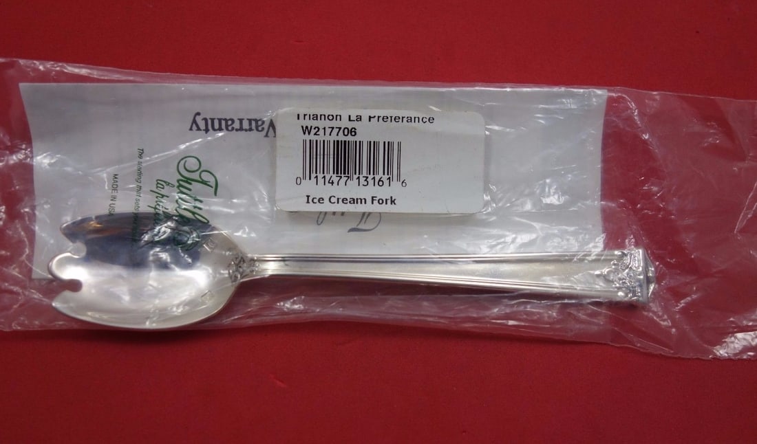Tuttle Trianon Sterling Silver Ice Cream Fork 5 3/4 Inch New: Tuttle Trianon Sterling Silver Ice Cream Fork 5 3/4 Inch New Introducing the exquisite Trianon by Tuttle Sterling Silver Ice Cream Fork, measuring 5 3/4 inches in length. Crafted by Tuttle, this beaut