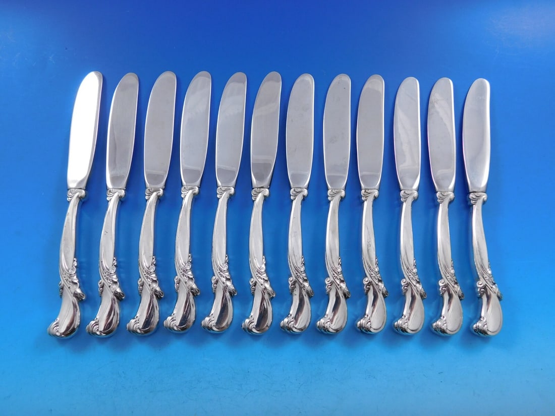 Wallace Waltz of Spring Set of 12 Sterling Silver Butter Spreaders: Wallace Waltz of Spring Set of 12 Sterling Silver Butter Spreaders Enhance your dining experience with this exquisite set of 12 butter spreaders from the renowned Wallace collection, featuring the ele