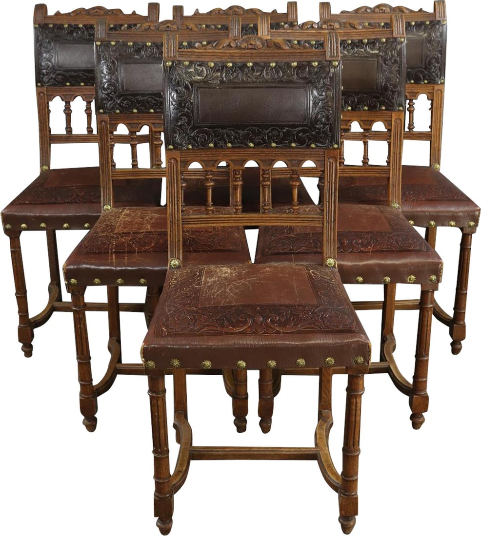 Antique Henry II Dining Chairs with Embossed Leather Seats: Antique Henry II Dining Chairs with Embossed Leather Seats Enhance your dining space with these Elegant Antique Dining Chairs in the distinguished Henry II style. Crafted in 1900, these chairs