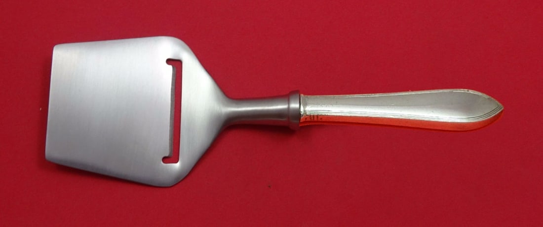 Tiffany & Co Reeded Edge Sterling Silver Cheese Plane Custom 8 1/4 in: Tiffany & Co Reeded Edge Sterling Silver Cheese Plane Custom 8 1/4 in This exquisite cheese plane features the Reeded Edge pattern by Tiffany & Co., a renowned name in fine craftsmanship. Made from st