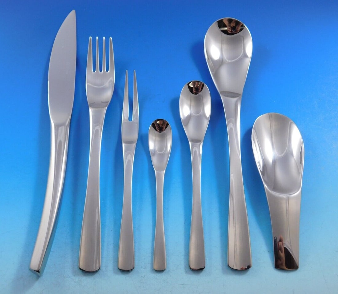 Guy Degrenne XY 81 Piece Stainless Steel Flatware Set with Caddy: Guy Degrenne XY 81 Piece Stainless Steel Flatware Set with Caddy Discover the exquisite XY Stainless Steel Flatware Set by Guy Degrenne, featuring a unique modern design that embodies both masculine a