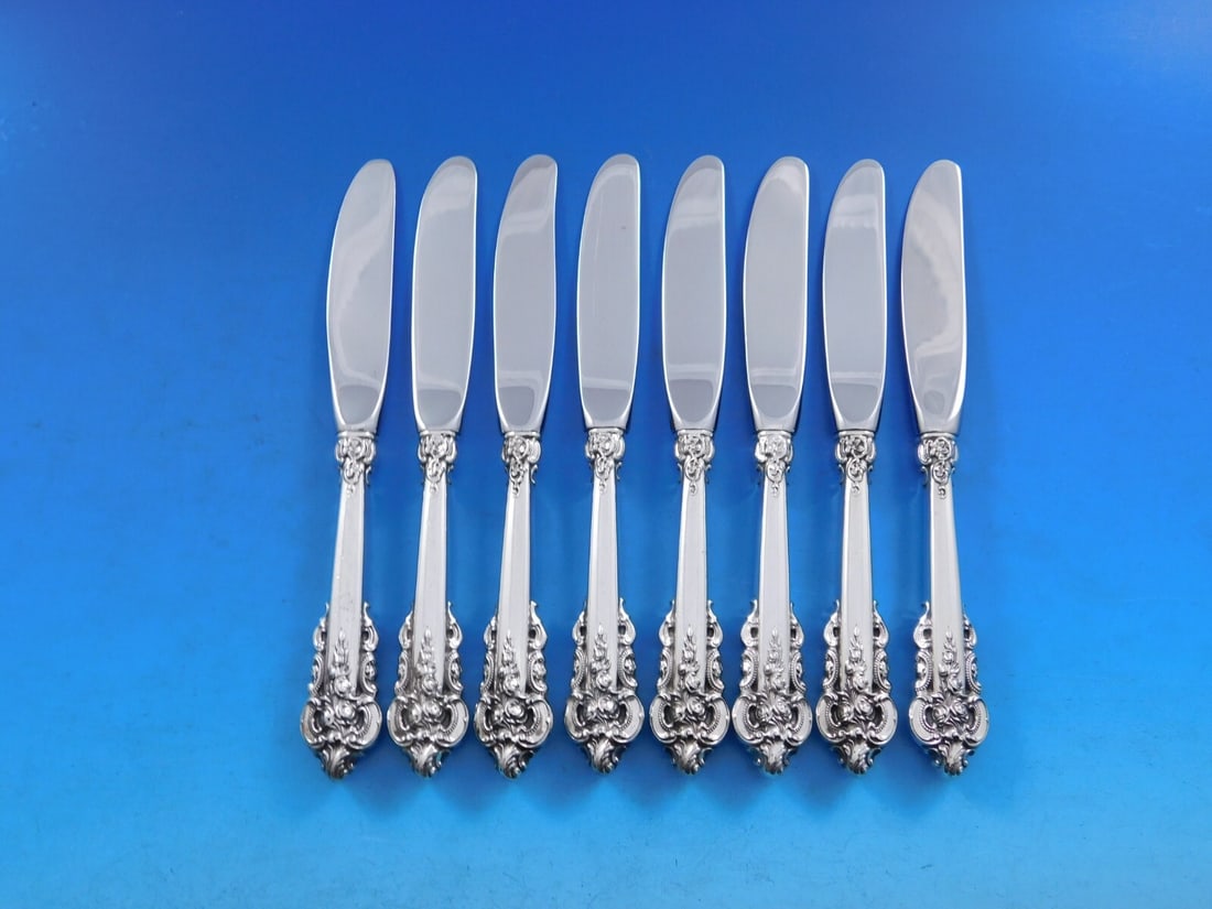 Wallace Grande Baroque Sterling Silver Butter Spreaders Set of 8: Wallace Grande Baroque Sterling Silver Butter Spreaders Set of 8 Enhance your dining experience with this exquisite set of eight butter spreaders from the Grande Baroque pattern by Wallace. Crafted fr