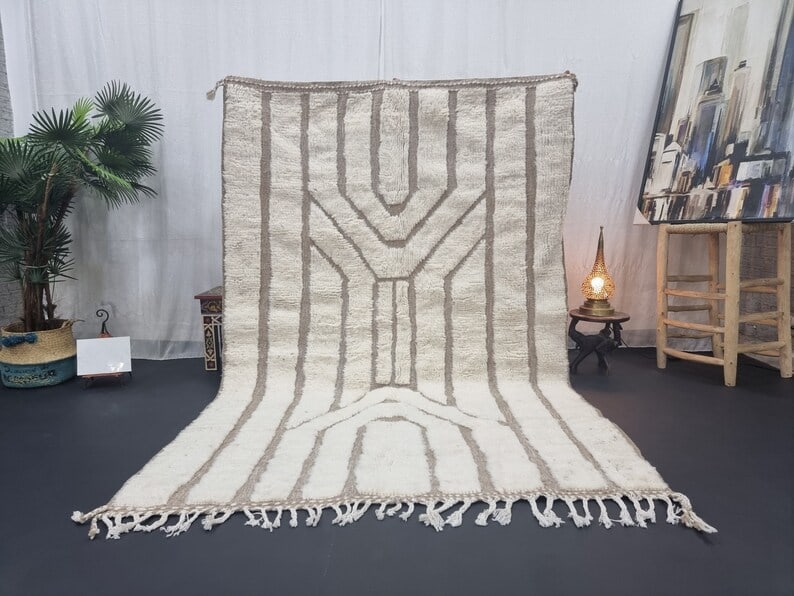 Authentic Handwoven Soft White Engraved Rug from Morocco: Authentic Handwoven Soft White Engraved Rug from Morocco Experience the beauty of authentic craftsmanship with this Soft White Engraved Rug. Handwoven in the Atlas Mountains by talented local Berber w