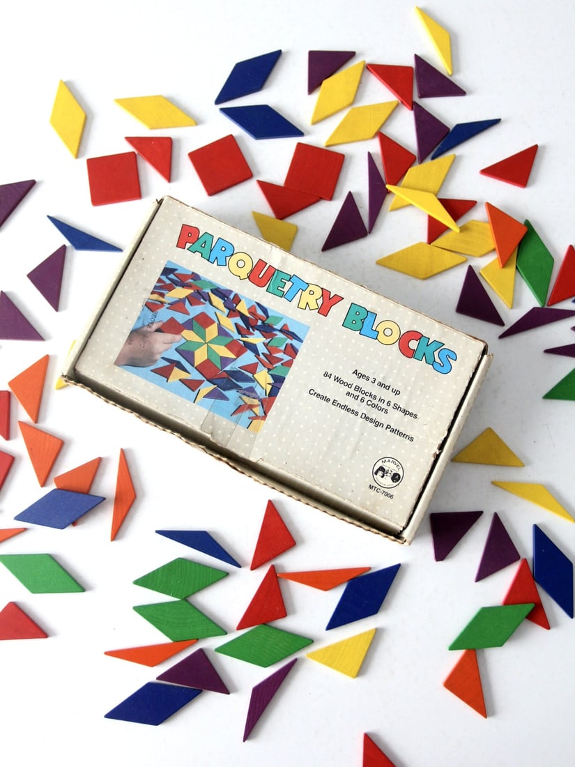 Mid-Century Marvel Education Parquetry Blocks Set of 88: Mid-Century Marvel Education Parquetry Blocks Set of 88 Discover the charm of this Mid-Century Parquetry Blocks Set by the Marvel Education Company, featuring a collection of classic wooden toy blocks