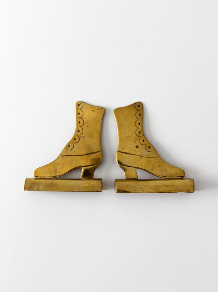 Victorian Brass Boot Mantel Ornaments Pair Antique Decor: Victorian Brass Boot Mantel Ornaments Pair Antique Decor This exquisite pair of antique brass mantel ornaments is designed in the shape of Victorian ladies' boots. Each ornament showcases intricate sc