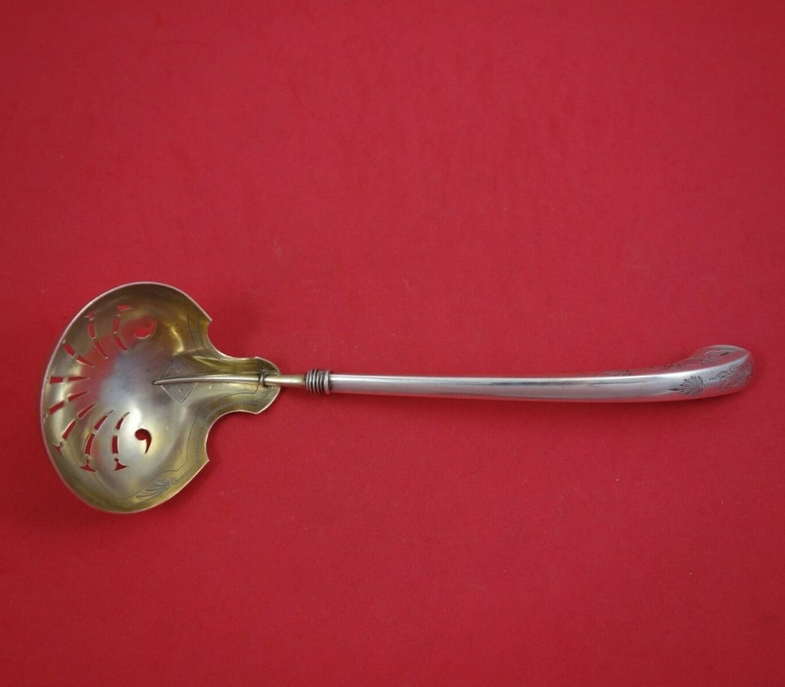 Gorham Angelo Sterling Silver Oyster Ladle 9 1/4" Light Gold Wash: Gorham Angelo Sterling Silver Oyster Ladle 9 1/4" Light Gold Wash This exquisite ladle from Gorham's Angelo pattern is a perfect blend of elegance and functionality. Crafted from sterling silver, it f