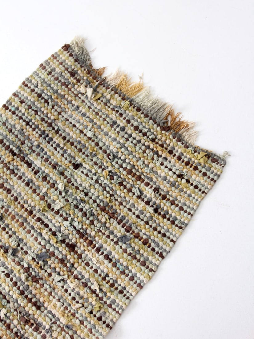 48 x 29.5 Inch Woven Vintage American Striped Rag Rug: 48 x 29.5 Inch Woven Vintage American Striped Rag Rug This vintage American rag rug features a balanced palette of cream, tan, gray, brown, and soft blue tones, woven into a striped pattern with a tex