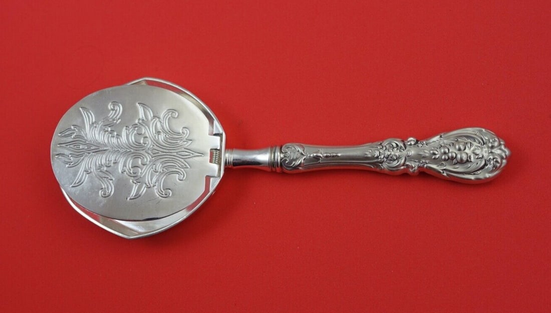 Reed and Barton Francis I Sterling Silver Tea Bag Press 7.5 inches: Reed and Barton Francis I Sterling Silver Tea Bag Press 7.5 inches Elevate your tea experience with this exquisite Tea Bag Press from the renowned Francis I pattern by Reed and Barton. Crafted from st