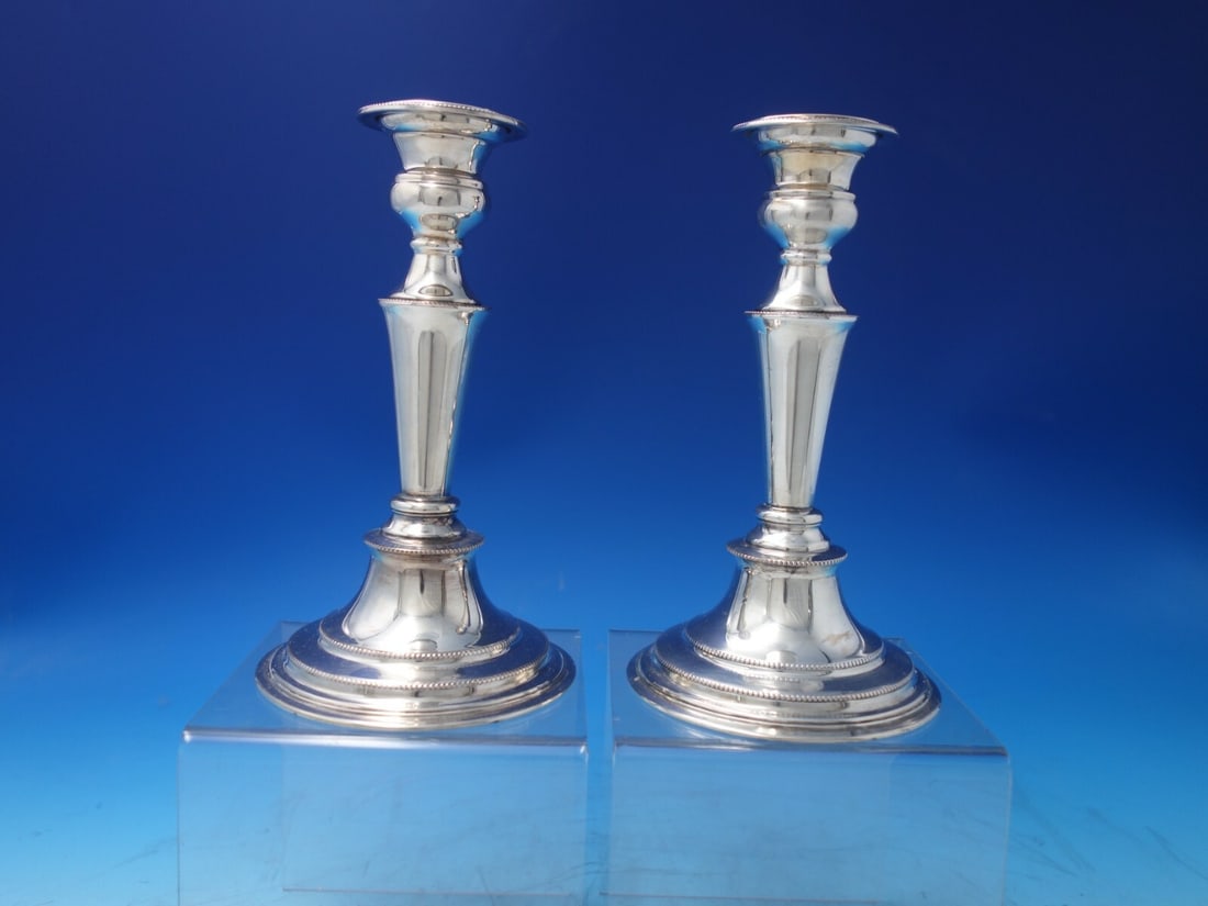 Beaded Silver and Copper Candlestick Pair by L.P. & Co 1930: Beaded Silver and Copper Candlestick Pair by L.P. & Co 1930 This exquisite pair of candlesticks, crafted by L.P. & Co., features a charming beaded pattern and is made from a combination of silver and