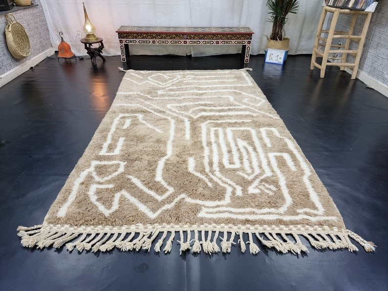 Authentic Handmade Moroccan Berber Wool Rug 3.28 x 10 ft: Authentic Handmade Moroccan Berber Wool Rug 3.28 x 10 ft Experience the elegance of this authentic Soft Brown Handmade Moroccan Berber Wool Rug, featuring a striking white assorted pattern. Handwoven