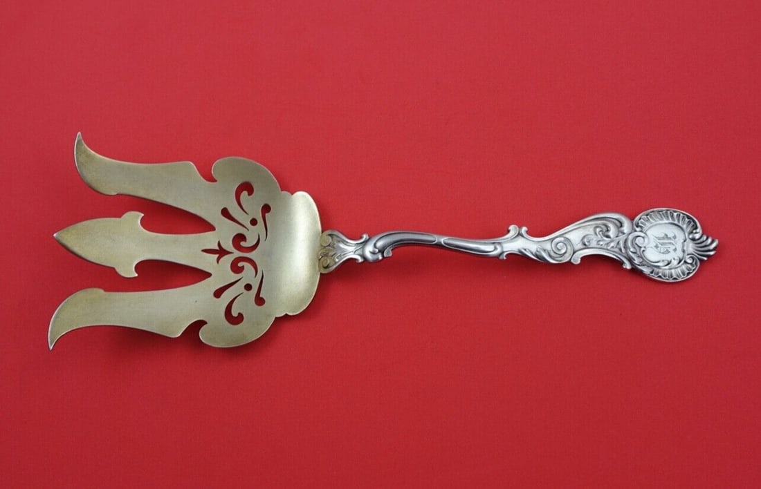 Shiebler Rococo Sterling Silver Asparagus Fork Goldwashed 9.5": Shiebler Rococo Sterling Silver Asparagus Fork Goldwashed 9.5" This beautiful Rococo-style asparagus fork by Shiebler is crafted from high-quality sterling silver and features a pierced design with a