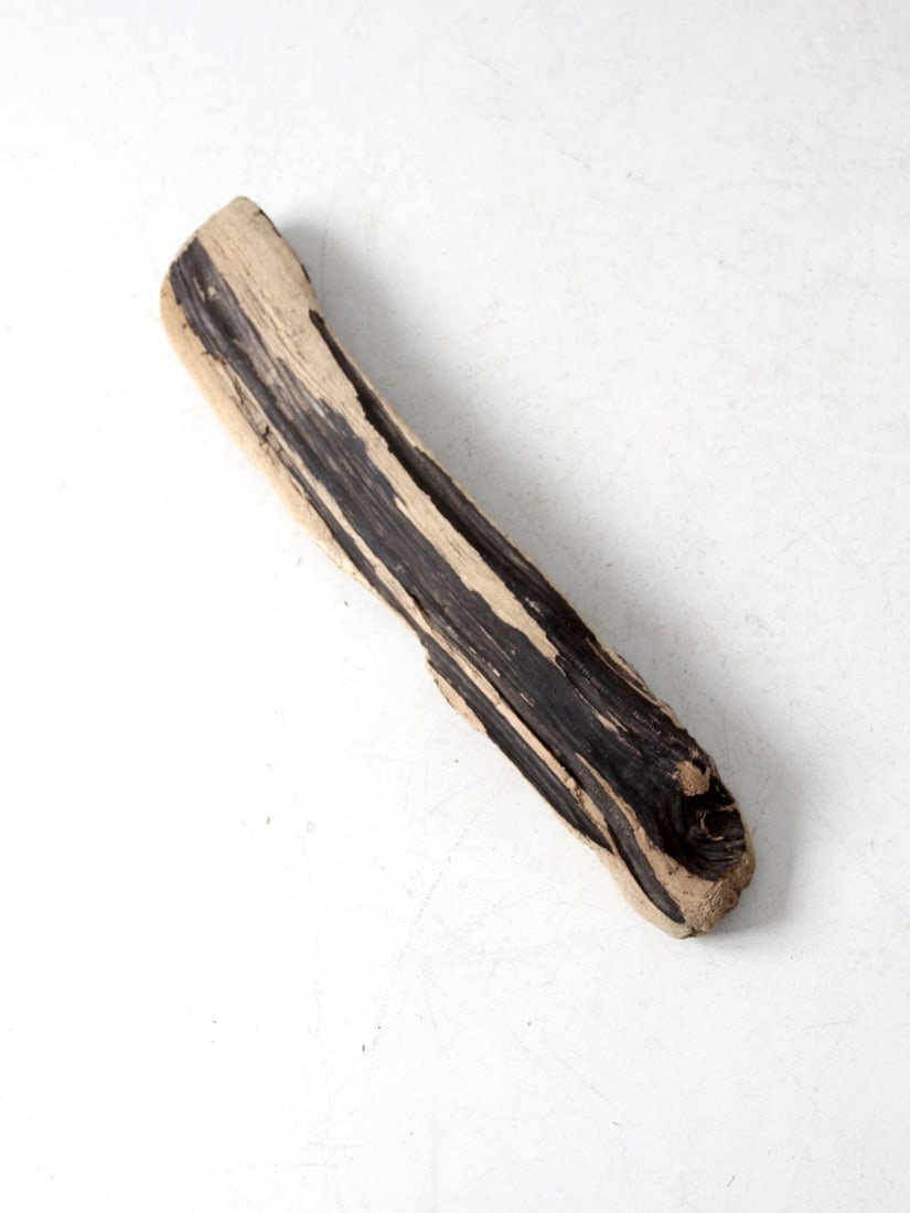 Unique Vintage Driftwood Branch 27 Inch Coastal Decor Accent: Unique Vintage Driftwood Branch 27 Inch Coastal Decor Accent This vintage driftwood branch showcases a rich natural texture with weathered tones of near-black and sand. Its organic shape serves as a s