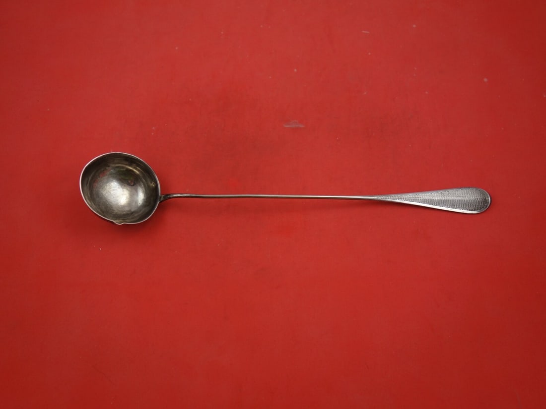 Louis XV Vintage Sterling Silver Claret Ladle 11 3/4 Inch: Louis XV Vintage Sterling Silver Claret Ladle 11 3/4 Inch This exquisite vintage claret ladle, crafted from French sterling silver, measures 11 3/4 inches in length. The ladle showcases a classic desi