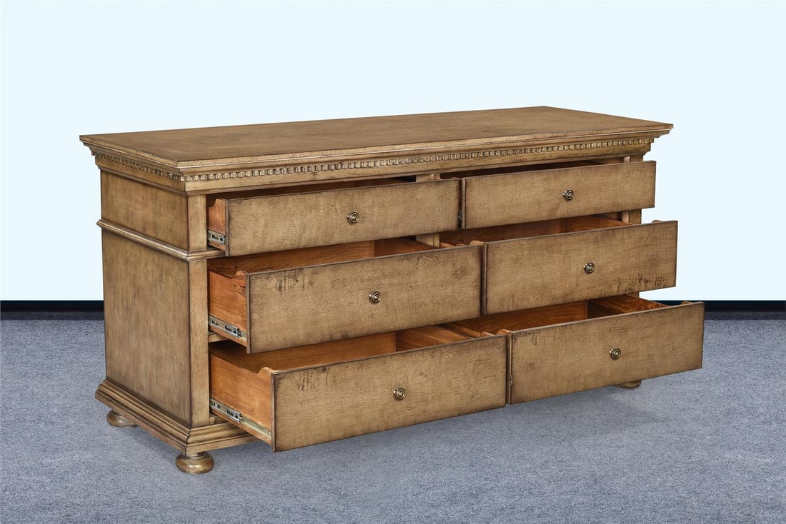 Blake Six Drawer Dresser in Driftwood Finish: Blake Six Drawer Dresser in Driftwood Finish Introducing the Stylish Blake Dresser, designed to enhance your space with ample storage and a contemporary aesthetic. This six-drawer dresser features a b