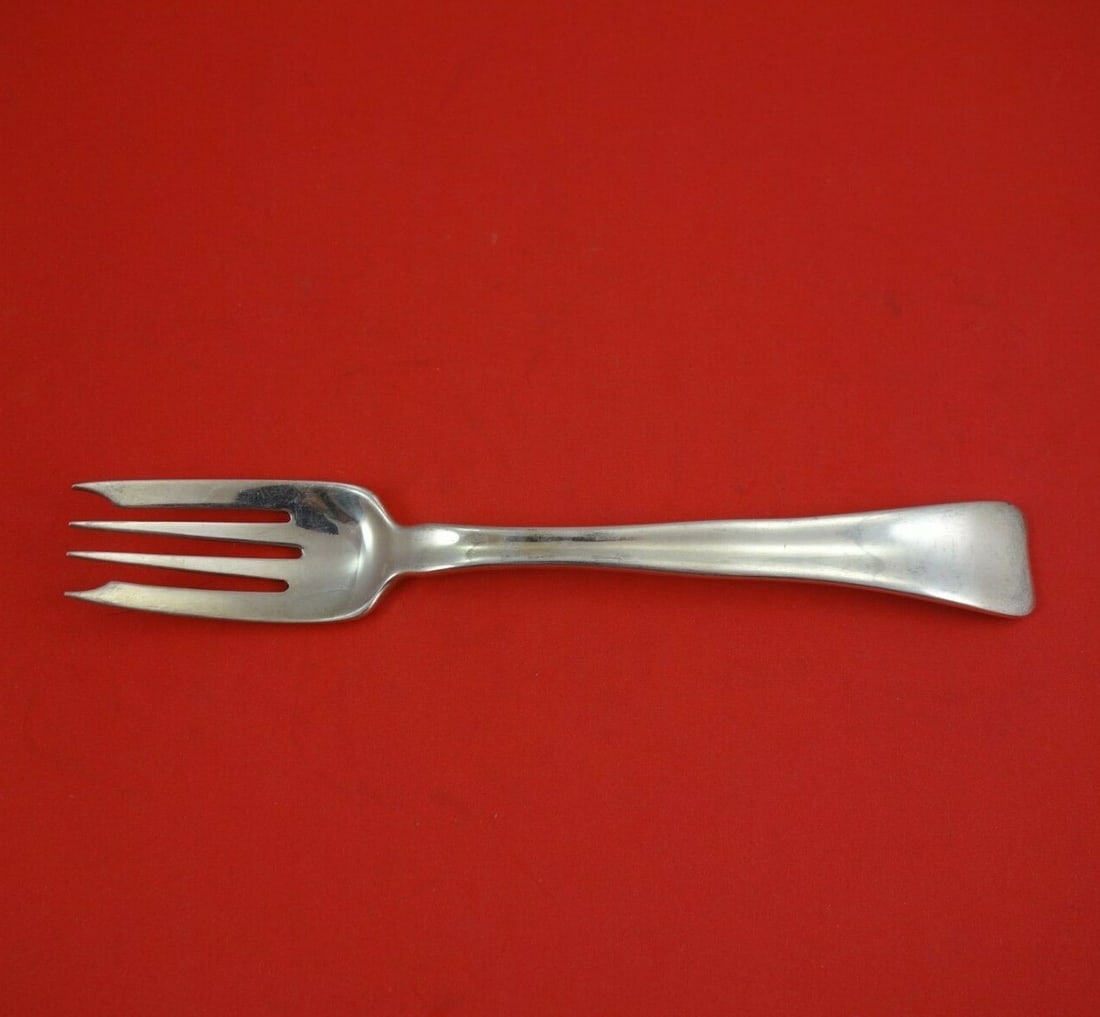 Tiffany & Co Sterling Silver Salad Fork Lap Over Edge Plain 6 3/4": Tiffany & Co Sterling Silver Salad Fork Lap Over Edge Plain 6 3/4" This exquisite salad fork, crafted by Tiffany & Co. in the 19th century, features the elegant Lap Over Edge Plain pattern. Measuring