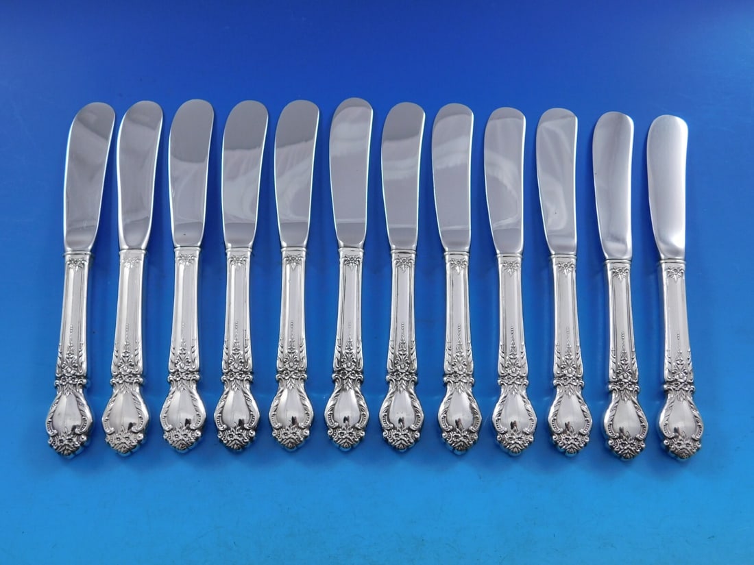 International Silver Brocade 12 Piece Sterling Silver Butter Spreader Set 6": International Silver Brocade 12 Piece Sterling Silver Butter Spreader Set 6" Elevate your dining experience with this exquisite set of 12 butter spreaders from the Brocade pattern by International Sil