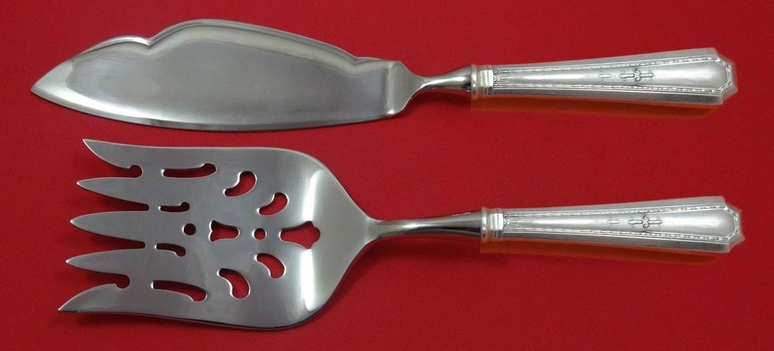 Durgin Gorham Colfax Sterling Silver Fish Serving Set 2 Piece: Durgin Gorham Colfax Sterling Silver Fish Serving Set 2 Piece Enhance your dining experience with the Colfax by Durgin-Gorham Sterling Silver Fish Serving Set. This exquisite 2-piece set showcases a d
