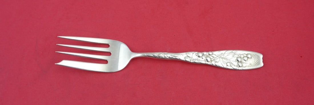 Whiting Berry Sterling Silver Salad Fork with Blueberries 6.25": Whiting Berry Sterling Silver Salad Fork with Blueberries 6.25" This exquisite salad fork is part of the Berry pattern by Whiting, showcasing a charming multi-motif design featuring blueberries. Made