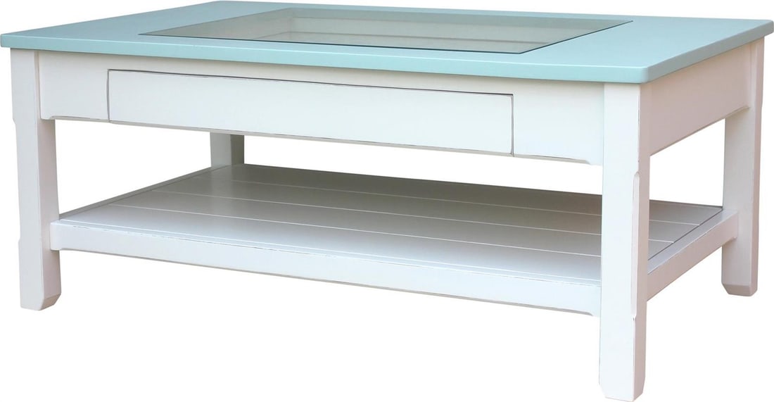 Trade Winds Aqua Velvet Rectangular Glass Coffee Table 43 x 26: Trade Winds Aqua Velvet Rectangular Glass Coffee Table 43 x 26 Elevate your living space with this stylish Aqua Velvet Drink Rectangular Glass Coffee Table. This stunning piece features a beautiful aq