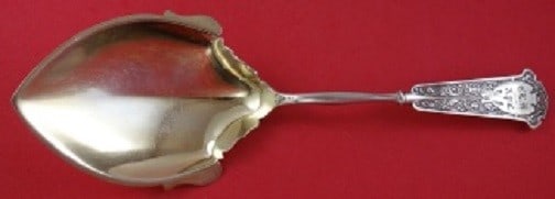 Whiting Alhambra Sterling Silver Gold Washed Serving Spoon 9 1/4": Whiting Alhambra Sterling Silver Gold Washed Serving Spoon 9 1/4" Discover the elegance of the Alhambra pattern with this exquisite pudding spoon made by Whiting. Crafted from high-quality sterling si
